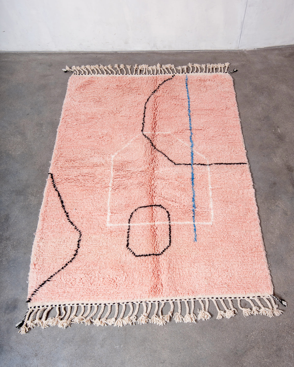 Modern, designer, handcrafted Berber rug from Morocco. Beniourain carpet with beautiful colours and patterns and fluffy wool texture.